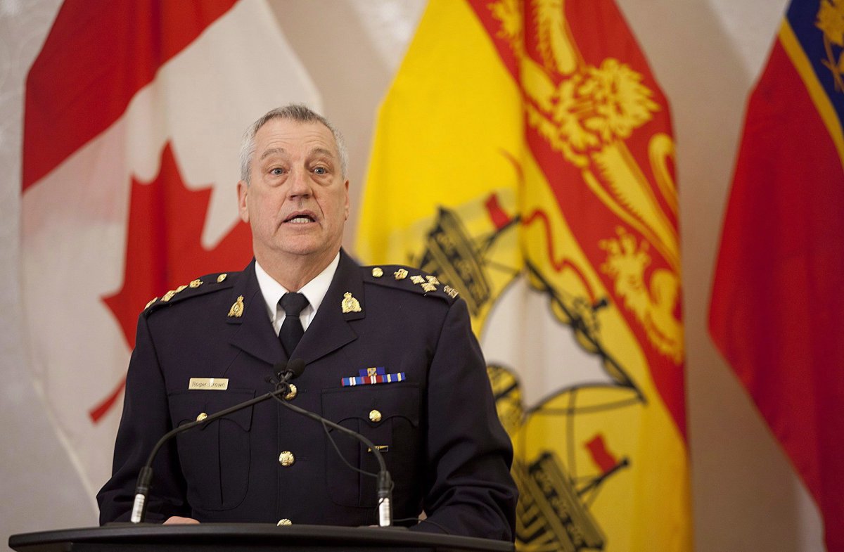 File - Then-RCMP Assistant Commissioner Roger L. Brown speaks to the media, in Moncton, N.B., on Tuesday, February 9, 2016. 