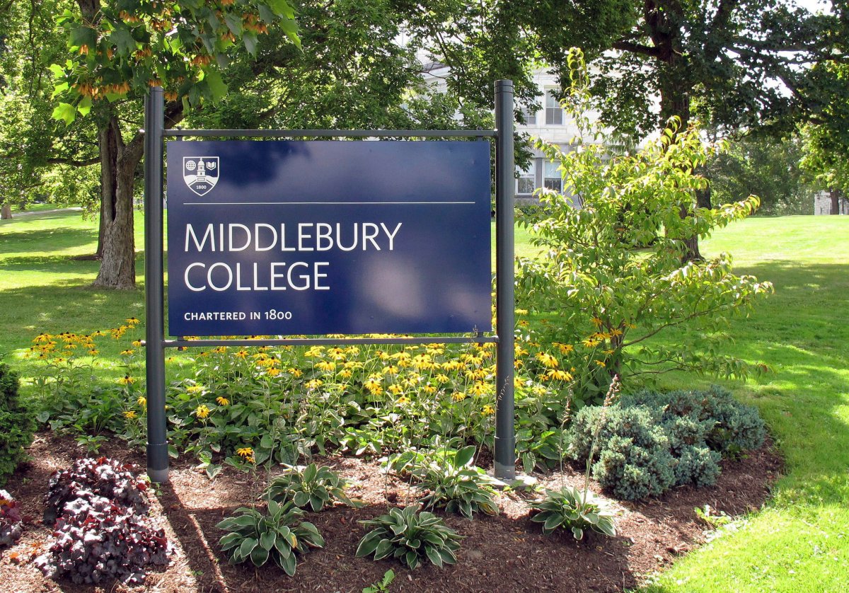 This Aug. 31, 2017 photo shows a sign for Middlebury College on the campus in Middlebury, Vt. Professor Jeff Byers apologized after his exams contained a question referencing the lethal dose hydrogen cyanide gas, which was used in the Holocaust.