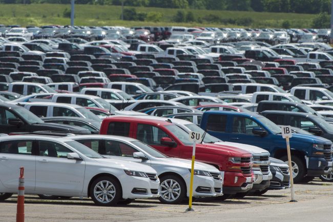 Vehicles are seen in a parking lot at the General Motors Oshawa Assembly Plant in Oshawa, Ont., on Wednesday, June 20, 2018. 


