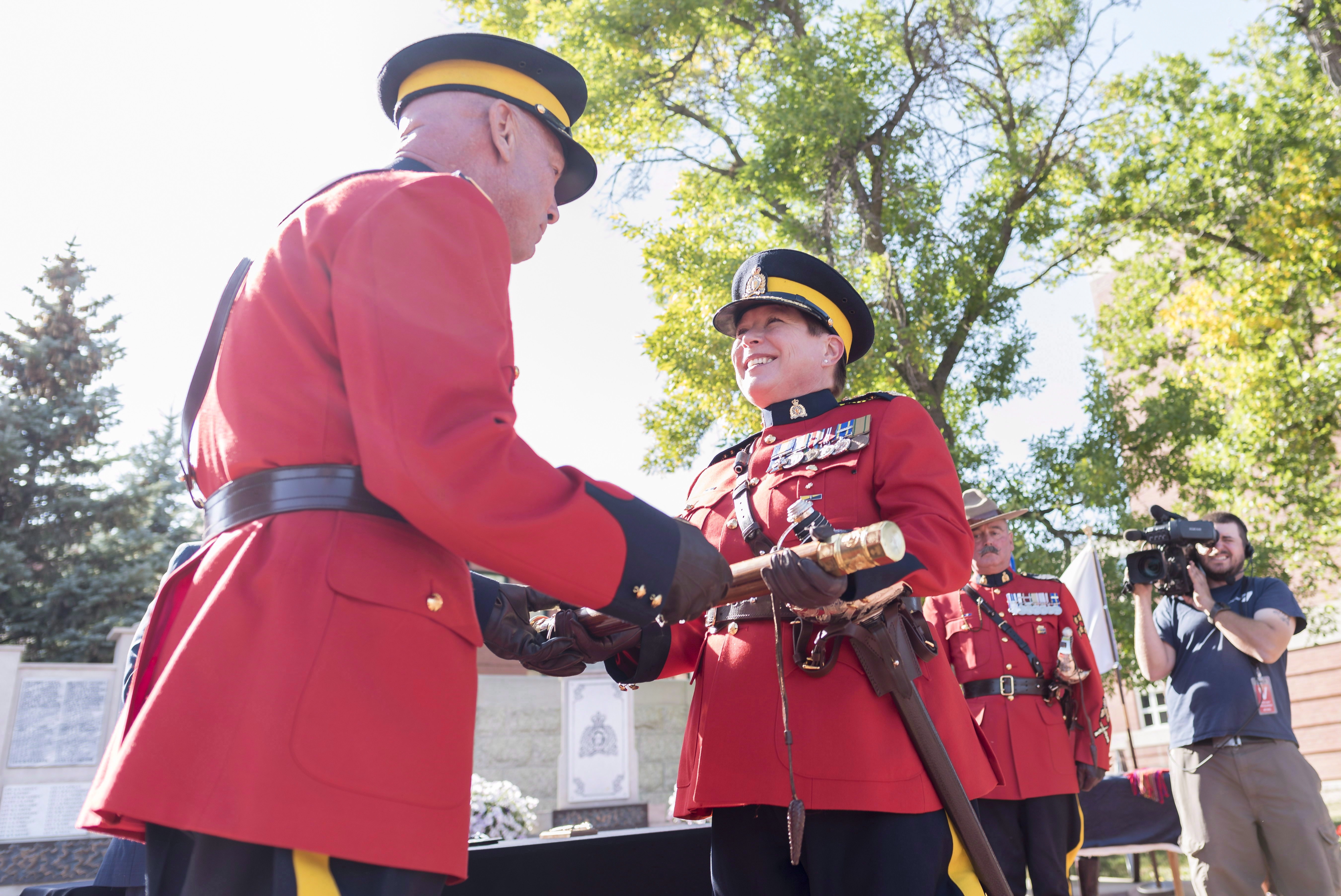 Outgoing RCMP Commissioner Bob Paulson, left, presents incoming RCMP Commissioner Brenda Lucki with the tip staff during the RCMP’s official Commissioner’s Change of Command ceremony in Regina in 2018. Prime Minister Justin Trudeau called Lucki “ someone who is constantly looking for ways to improve the status quo.”