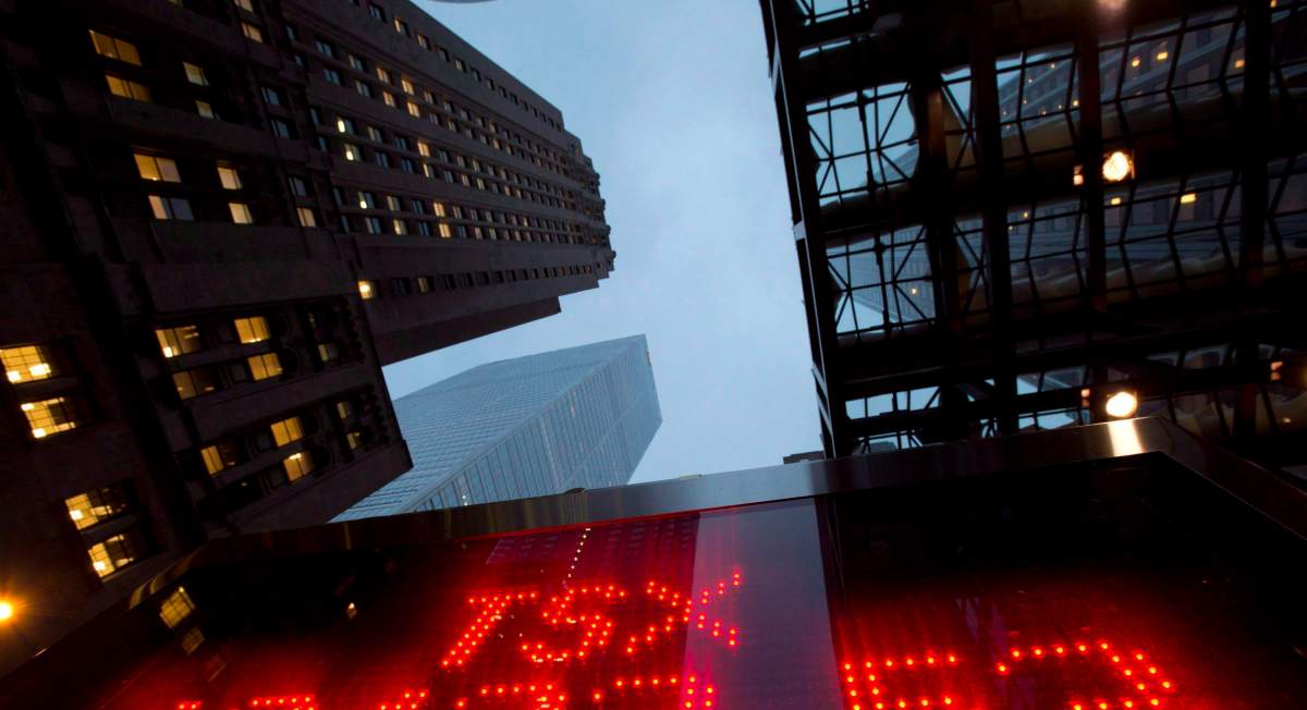 A TSX tote board is pictured in Toronto, on Dec. 31, 2012. The exchange hit an all-time high close on Thursday.