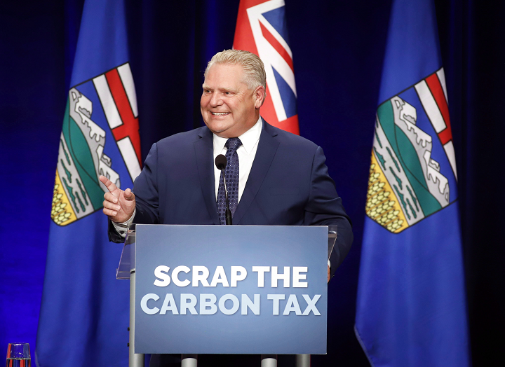 Ontario Premier Doug Ford speaks to supporters at an anti-carbon tax rally in Calgary, Friday, Oct. 5, 2018. 