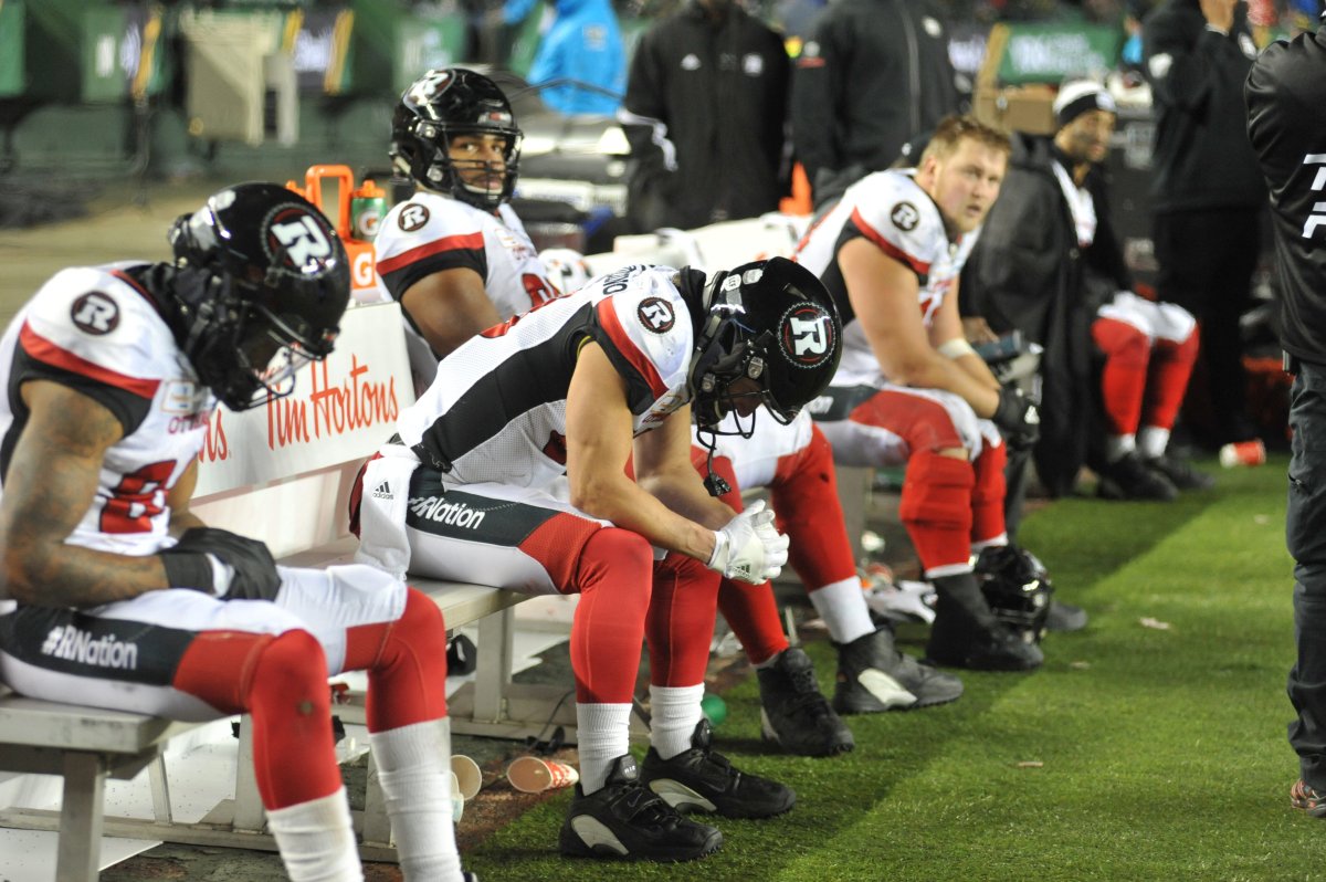 Ottawa Redblacks players sit dejected on the players bench during the 4th quarter of CFL Grey Cup game action between the Ottawa Redblacks and the Calgary Stampeders at The Brick Field at Commonwealth Stadium in Edmonton on Sunday, Nov. 25, 2018.