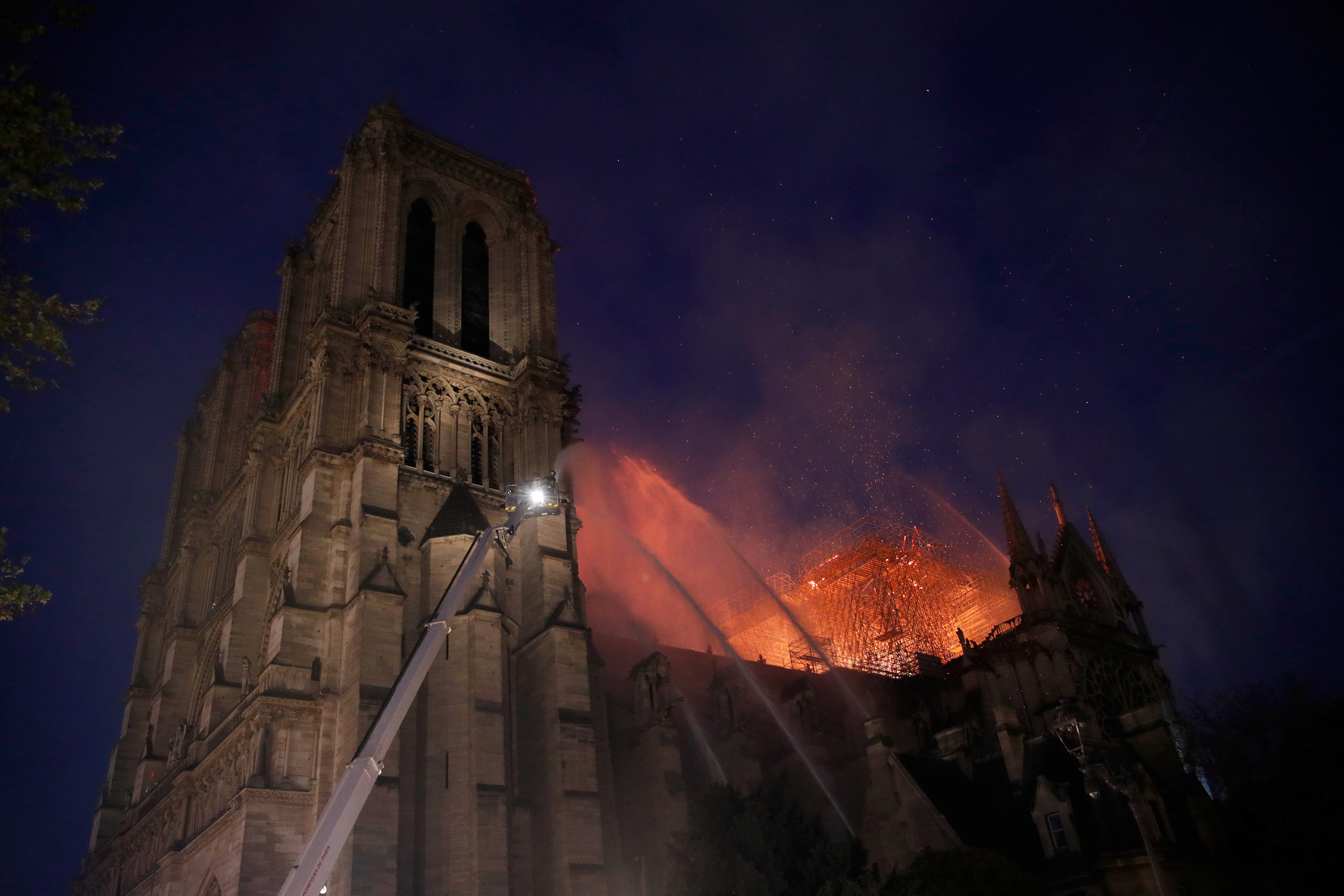 PHOTOS: Notre Dame Burned, And The Faithful Prayed For Its Survival ...