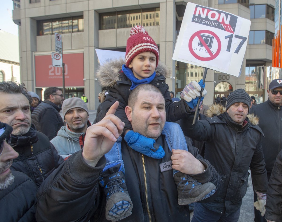 Taxi drivers take part in a one-day strike to protest new government regulations in Montreal on Monday, March 25, 2019. 