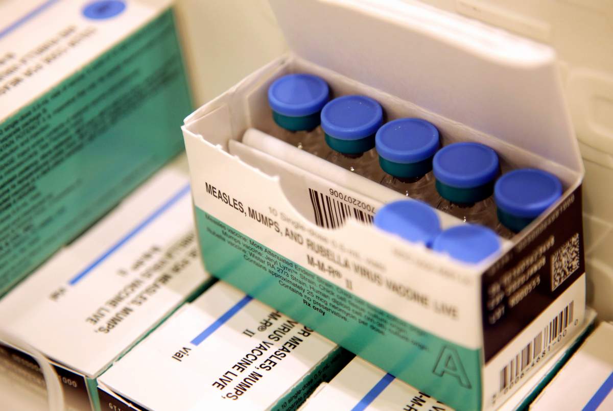FILE- In this March 27, 2019, file photo, measles, mumps and rubella vaccines.