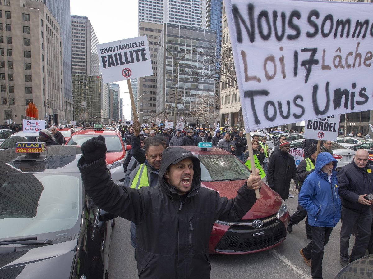 Quebec taxi drivers protest against new legislation to deregulate the industry, Friday, April 5, 2019 in Montreal.