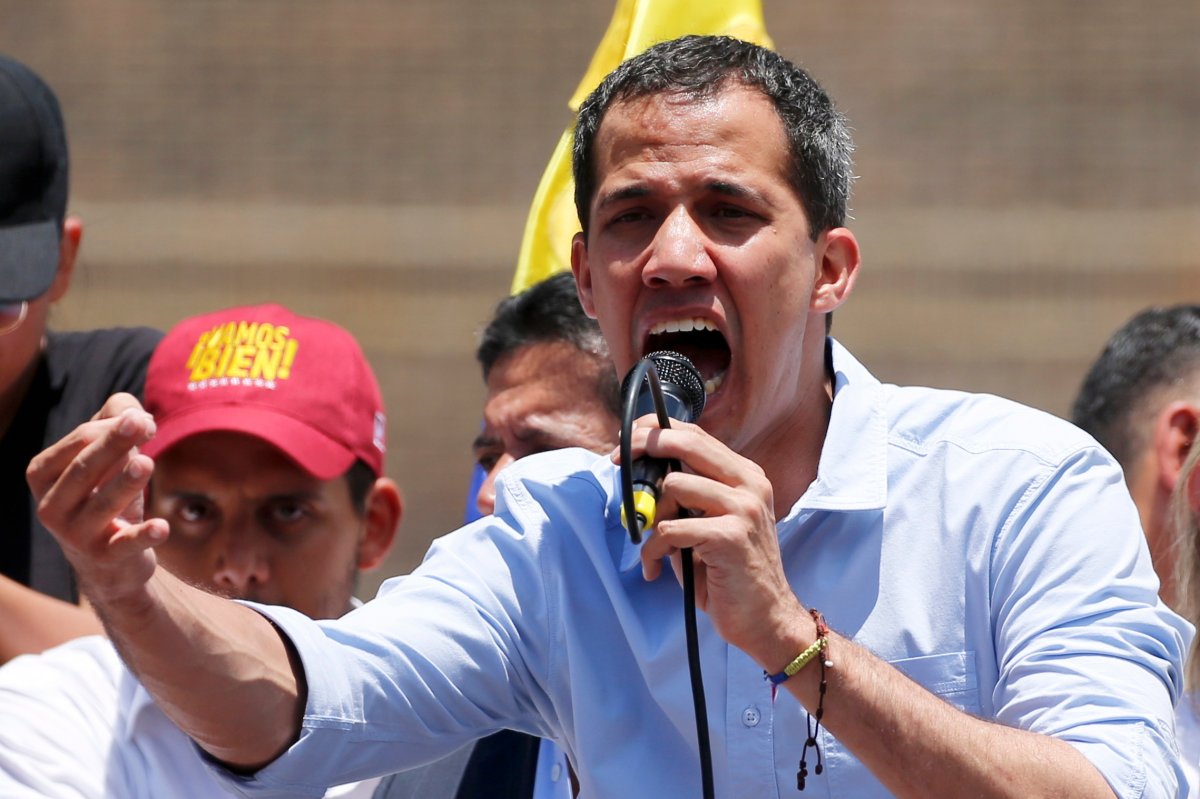 Opposition leader and self-proclaimed interim president Juan Guaido speaks to supporters during a rally to protest outages that left most of the country scrambling for days in the dark in Caracas, Venezuela, Saturday, April 6, 2019.