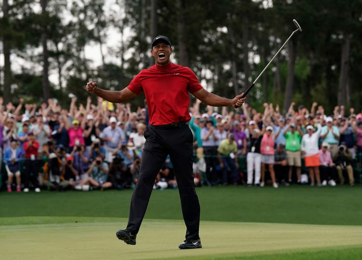 Tiger Woods reacts as he wins the Masters golf tournament Sunday, April 14, 2019, in Augusta, Ga.