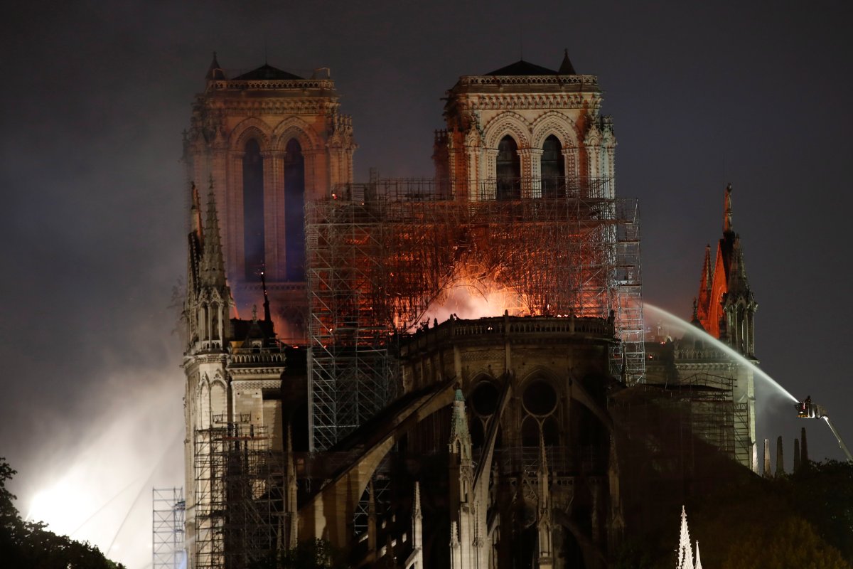 PHOTOS Notre Dame burned, and the faithful prayed for its survival