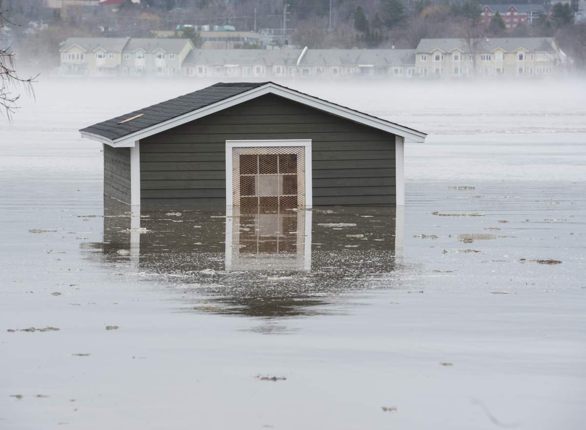 A city building along the St. John River is surrounded by flood waters in Fredericton on Sunday, April 21, 2019.