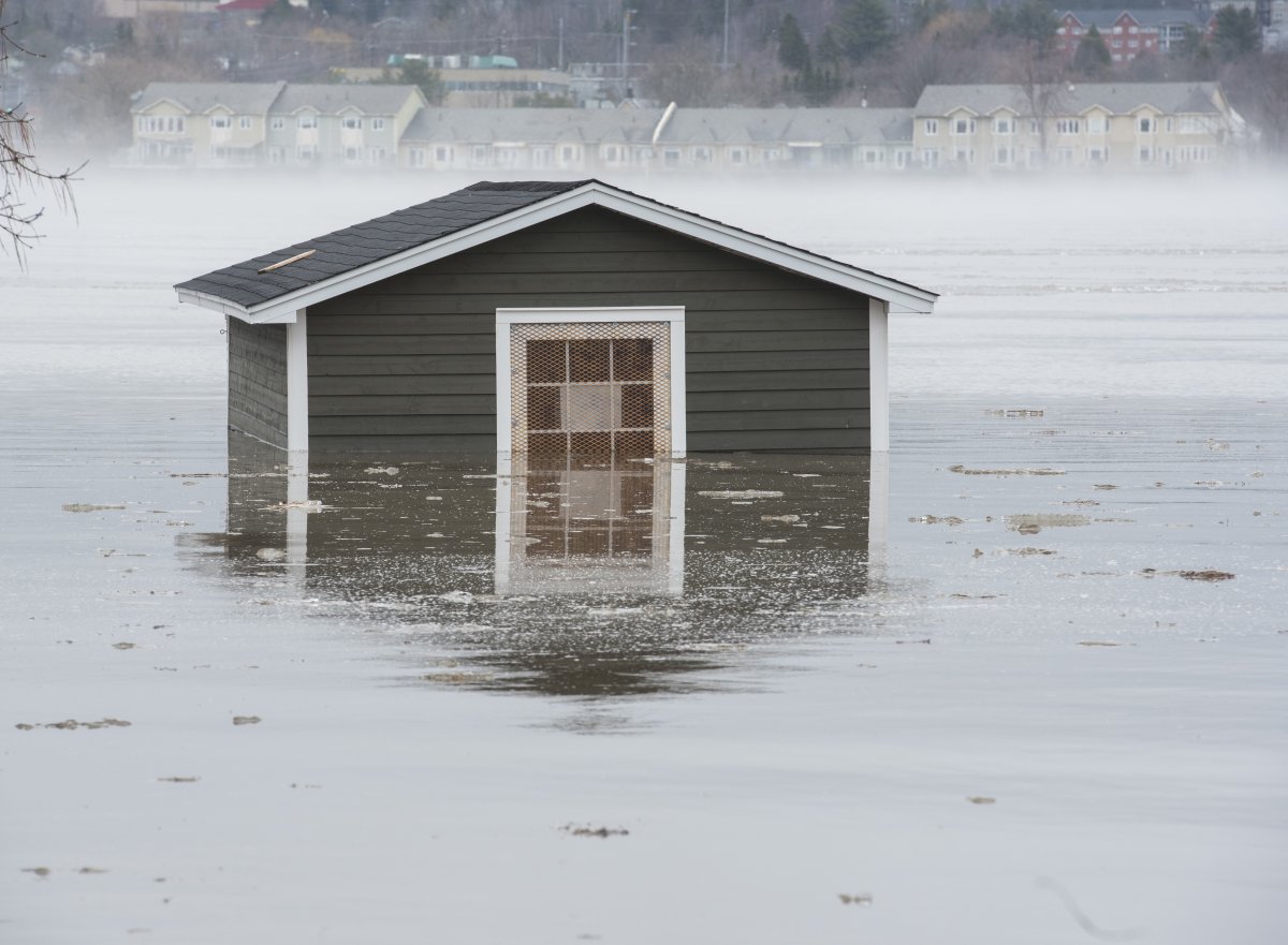 A city building along the St. John River is surrounded by flood waters in Fredericton on Sunday, April 21, 2019. 