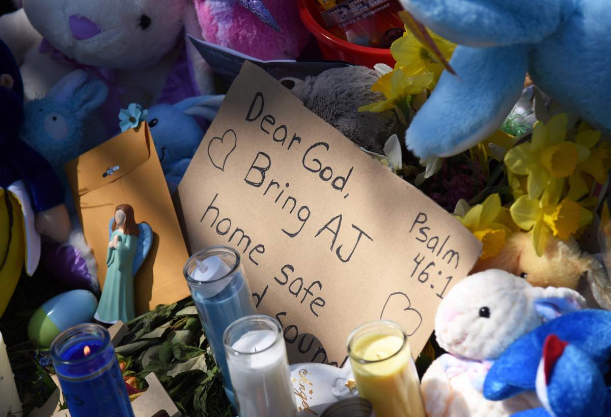 A makeshift memorial grows Monday, April 22, 2019 outside the Dole Avenue home of Andrew “AJ” Freund, age 5, in Crystal Lake, Ill.