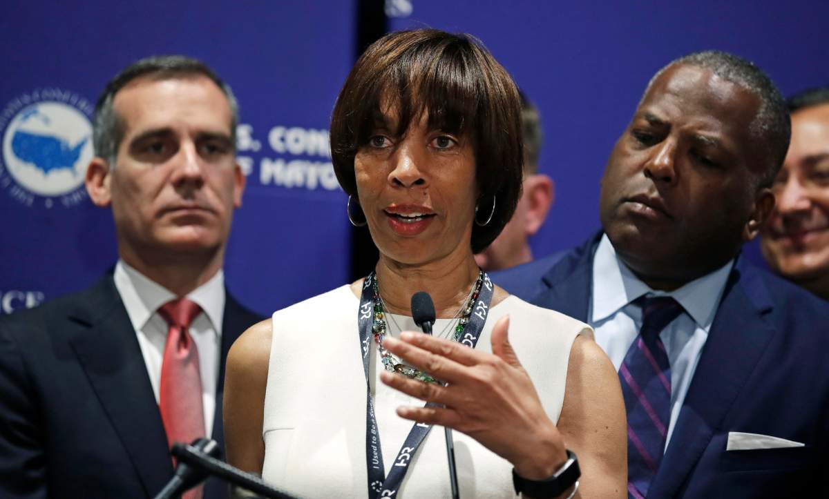 FILE – In this June 8, 2018 file photo, Baltimore Mayor Catherine Pugh addresses a gathering during the annual meeting of the U.S. Conference of Mayors in Boston.