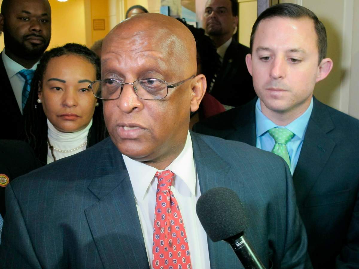 FILE – In a Tuesday, April 2, 2019 file photo, acting Baltimore Mayor Jack Young talks to reporters after meeting with state senators who represent Baltimore in Annapolis. It’s been more than three weeks since Mayor Catherine Pugh slipped out of sight on an indefinite leave of absence, and it appears Young is settling in for a lengthy stint as Baltimore’s No. 1 official.