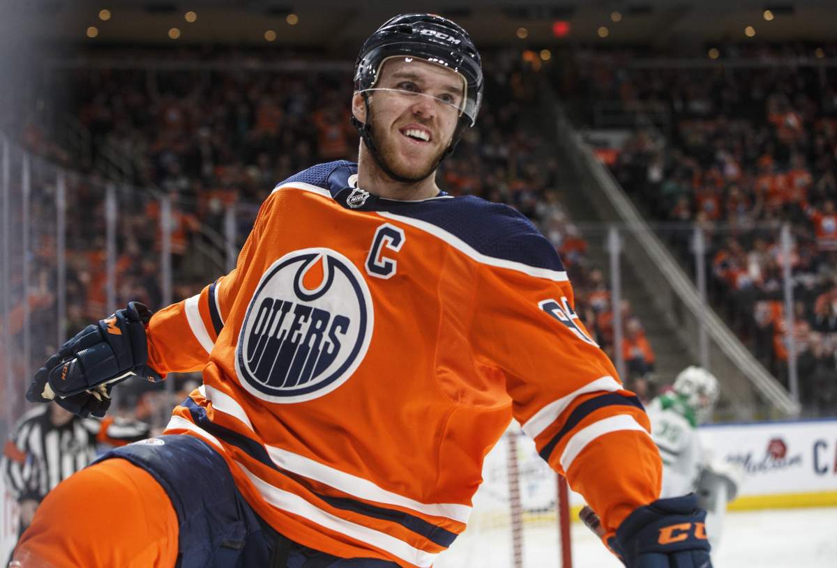 Edmonton Oilers’ Connor McDavid (97) celebrates a goal against the Dallas Stars during second period NHL action in Edmonton, Alta., on Thursday March 28, 2019.