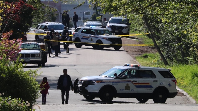Police at the scene of a fatal shooting in Surrey last Tuesday.
