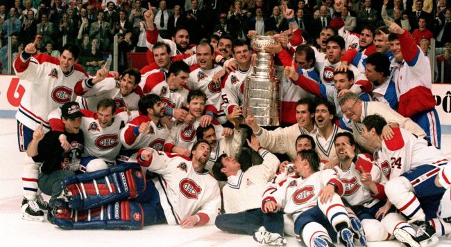 The Montreal Canadiens pose for a photograph with the Stanley Cup following their 4-1 victory over the Los Angeles Kings in Montreal in this June 9, 1993 photo.