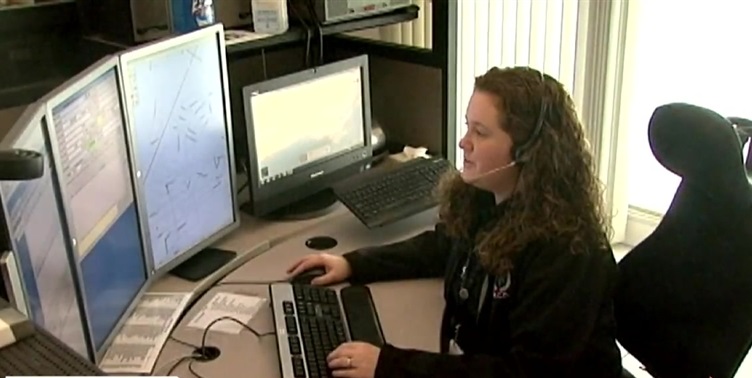 A 911 operator is shown in an undated photo.