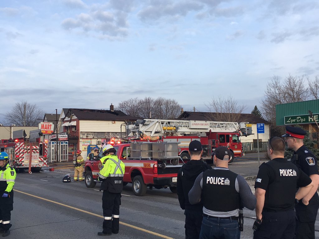 The front of 1004 Oxford Street is a convenience store, but the building stretches far back from the road and has three apartments.