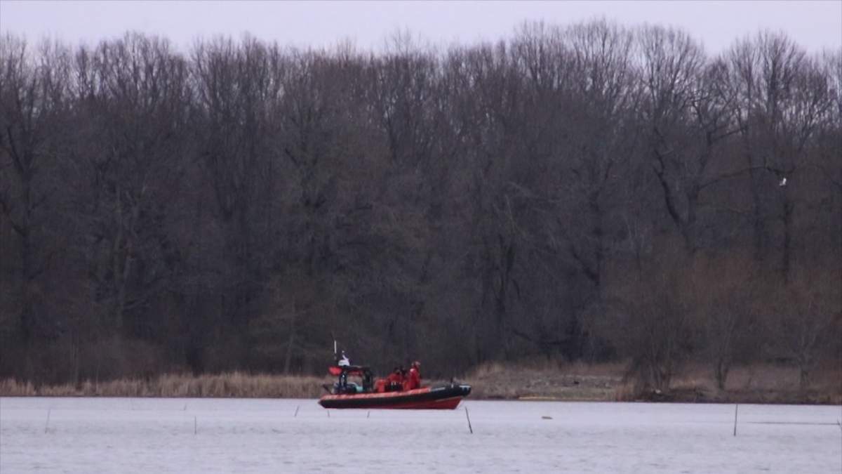Kingston police are asking for the public's assistance to help identify a woman who was found dead in a sailboat near Belle Park over the weekend.
