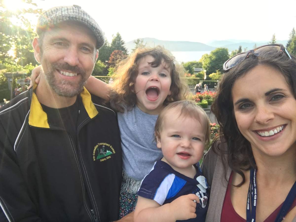 Brent Dueck, who received a kidney transplant 17 years ago, poses with his family.