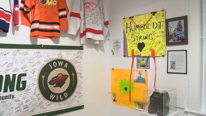 Jerseys, notes and supportive gestures at the Humboldt Broncos memorial exhibit.