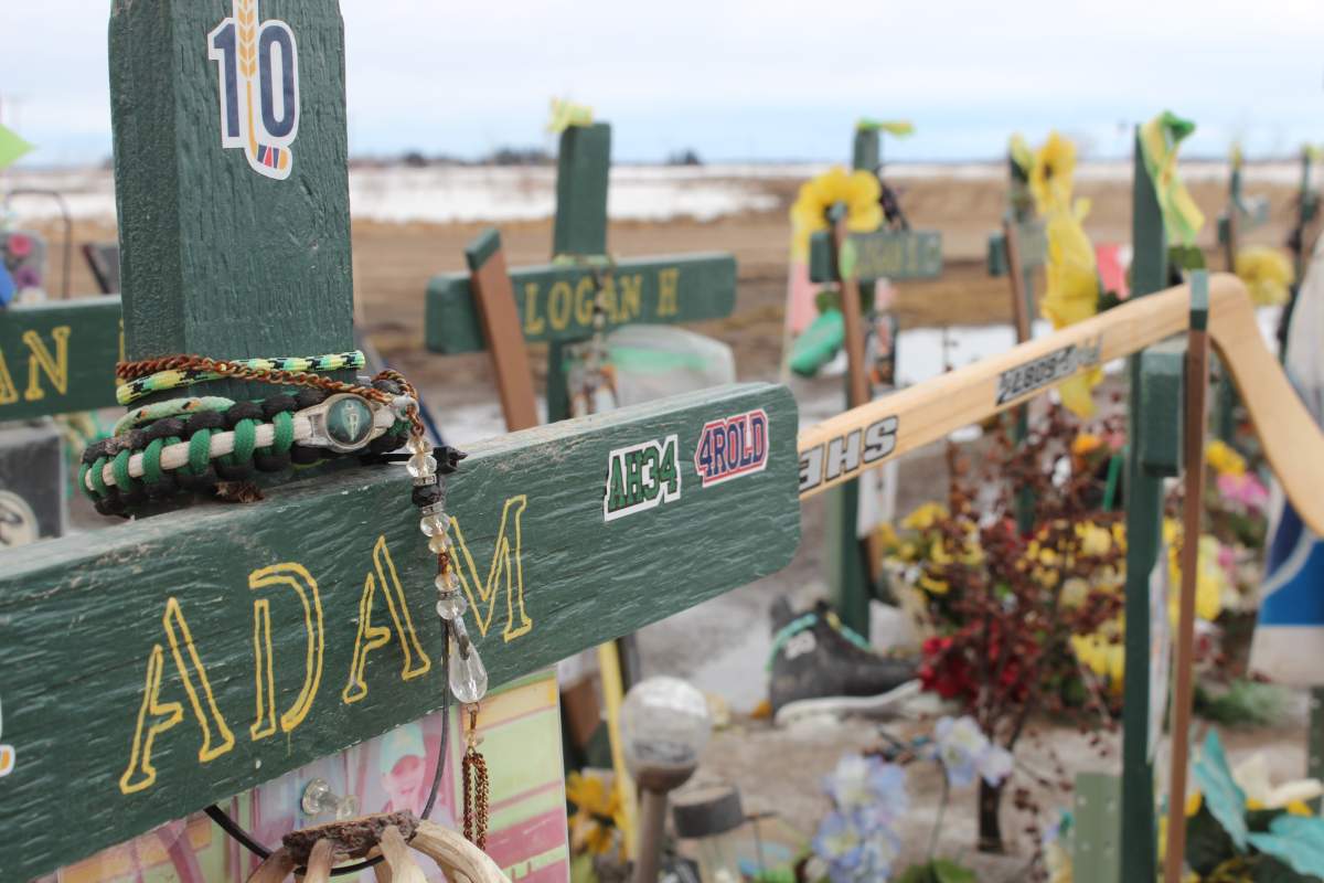 A green cross in honour of Adam Herold who was killed in the crash on April 6, 2018.