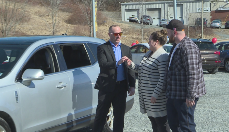 The Sparks family was presented with a new vehicle after losing everything in a house fire in Windsor on March 28. 
