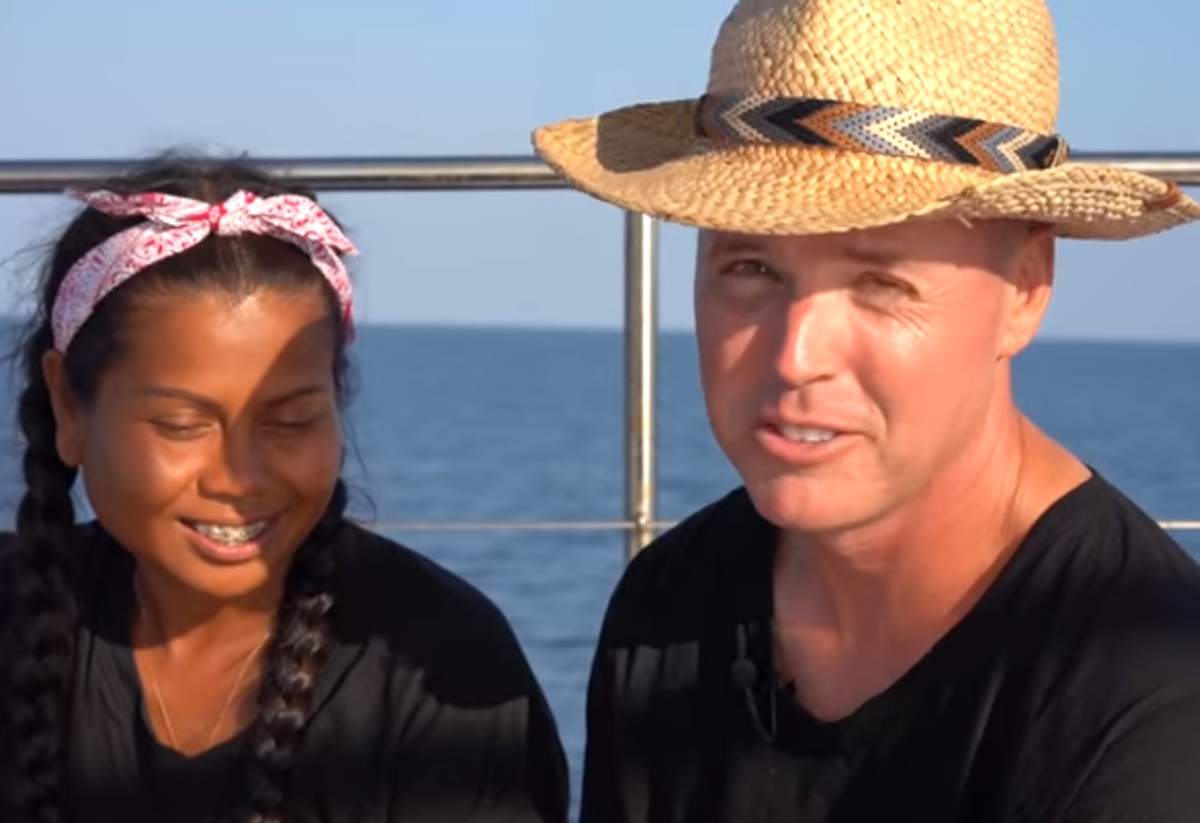 Chad Elwartowski, right, and Nadia Supranee Thepdet talk about living in an ocean home in this image from video.