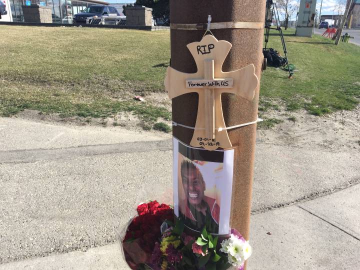 A roadside memorial set up in northeast Calgary one day after a fatal hit and run.