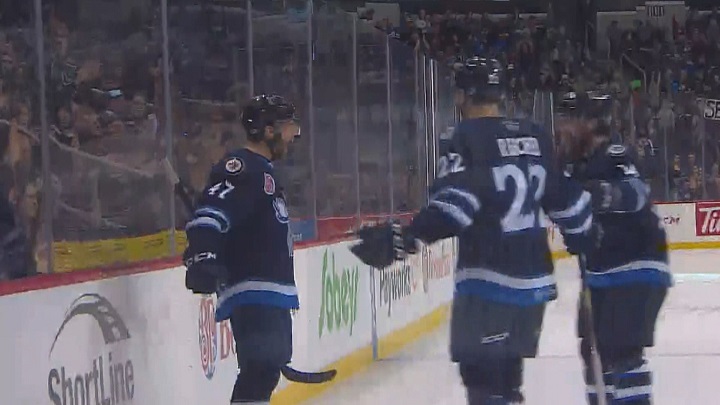 Manitoba Moose defenceman Charles-David Beaudoin celebrates his first goal of the season on Wednesday at Bell MTS Place.