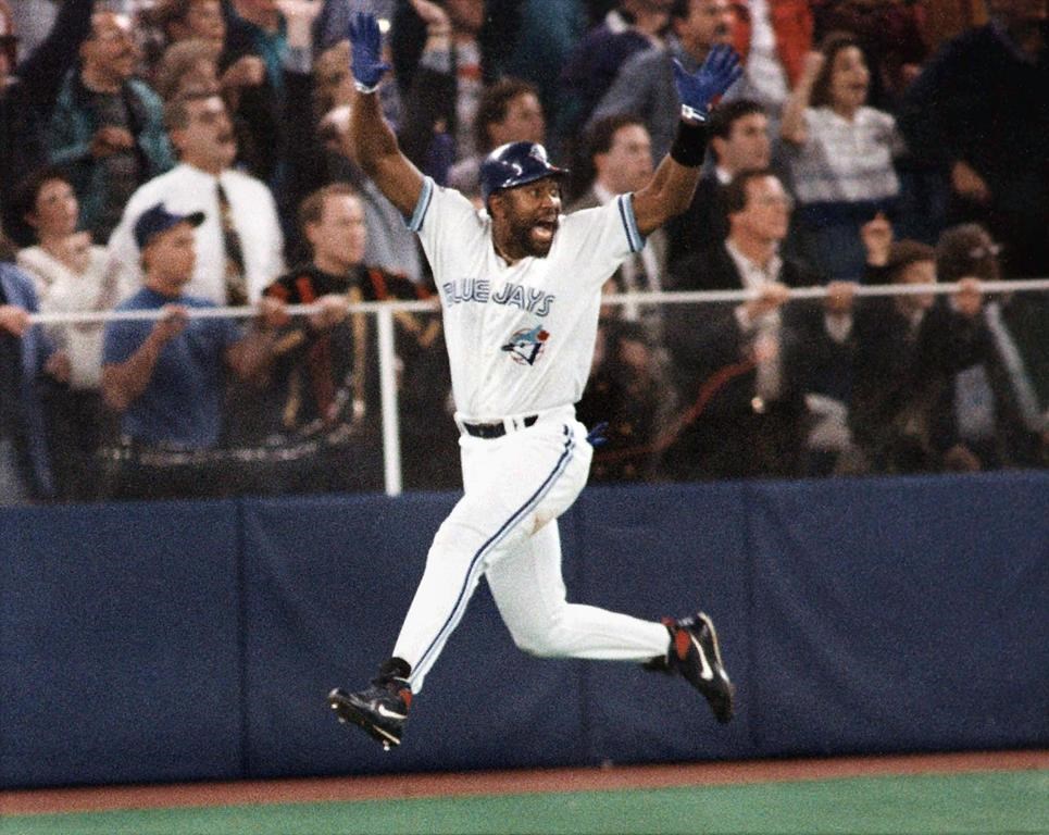 Toronto Blue Jays’ Joe Carter celebrates his game-winning three-run home run in the ninth inning of Game 6 of the World Series against the Philadelphia Phillies in Toronto, Oct. 23, 1993. THE CANADIAN PRESS/AP/Mark Duncan