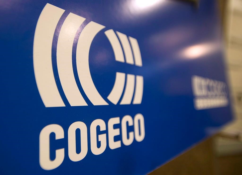 A Cogeco sign hangs at the company's annual general meeting in Montreal, Tuesday, January 14, 2014.