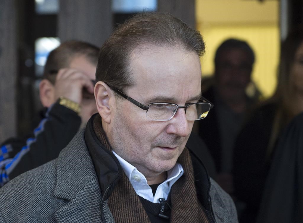 Glen Assoun heads from Nova Scotia Supreme Court in Halifax on Friday, March 1, 2019. A hearing to seek the release of evidence that led to the acquittal of a Nova Scotia man who was wrongfully convicted of murder has been set for early this summer.