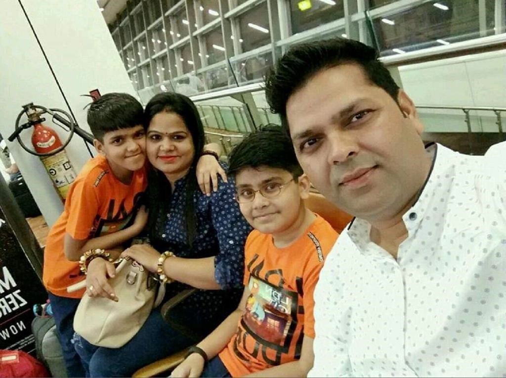 Ram Nivash Misra, right to left, Shreyaan Mishra, 10, Anupam Tripathi and Aarav Mishra, nine, are shown in this undated handout photo. THE CANADIAN PRESS/HO.