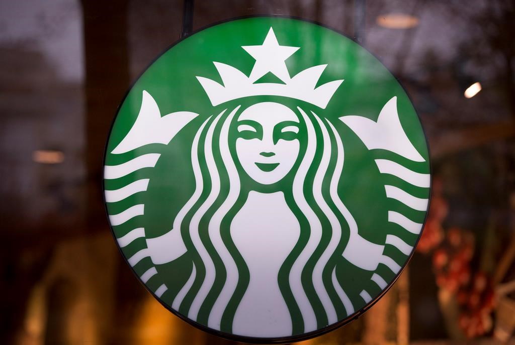 A Starbucks sign is pictured in downtown Vancouver on March 20, 2015. 