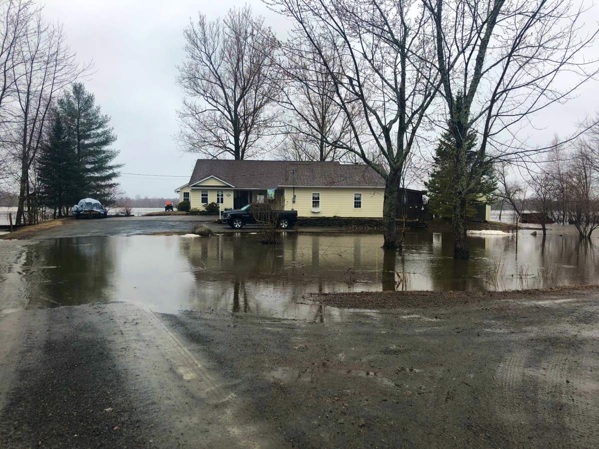 Dawn Sharpe of Maugerville, N.B., says her home’s driveway is now flooded and she’s temporarily relocated to the Maugerville Community Centre.