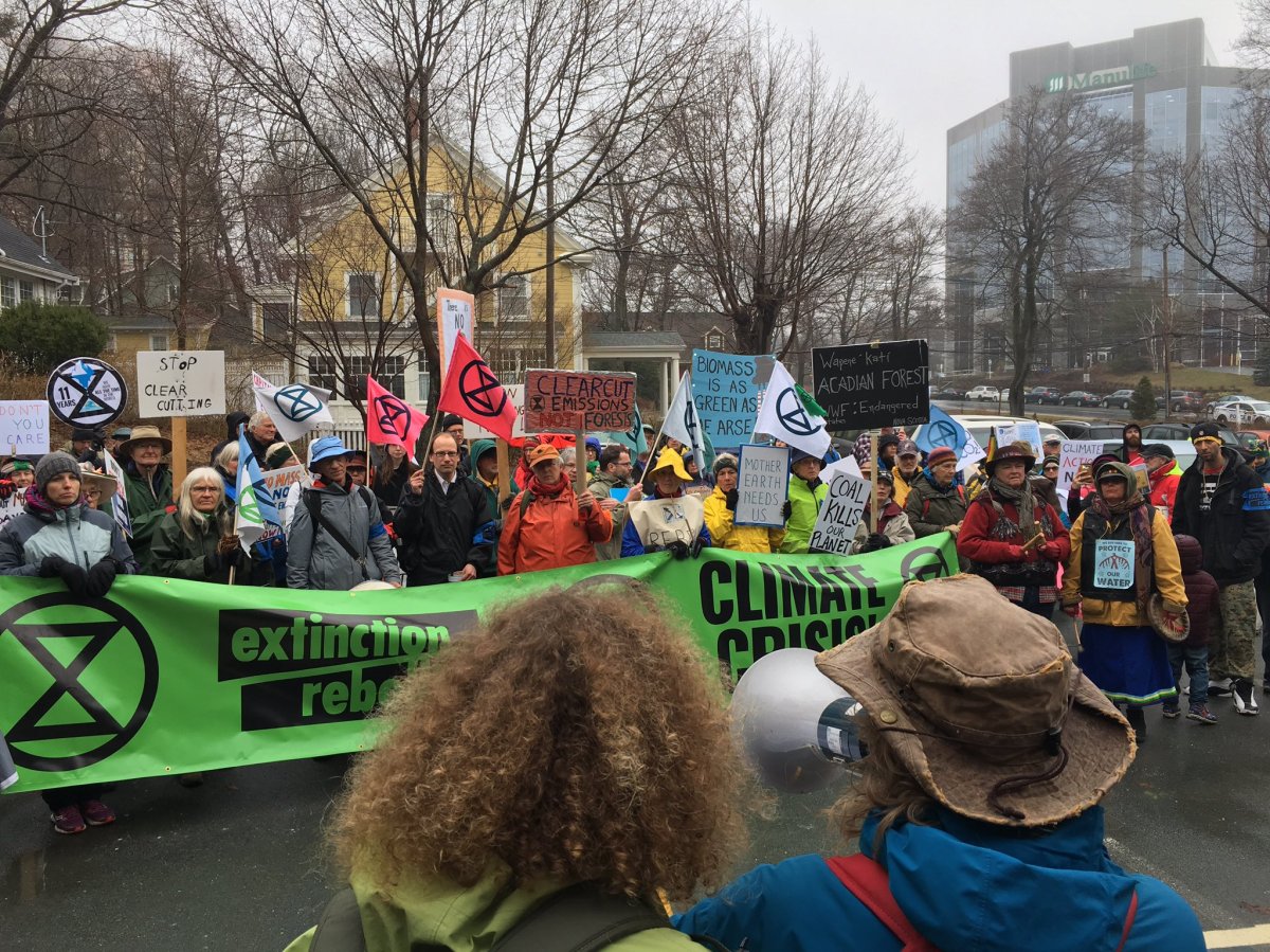 Members of Extinction Rebellion protest in front of The Chronicle Herald in Halifax, N.S., on April 15, 2019.