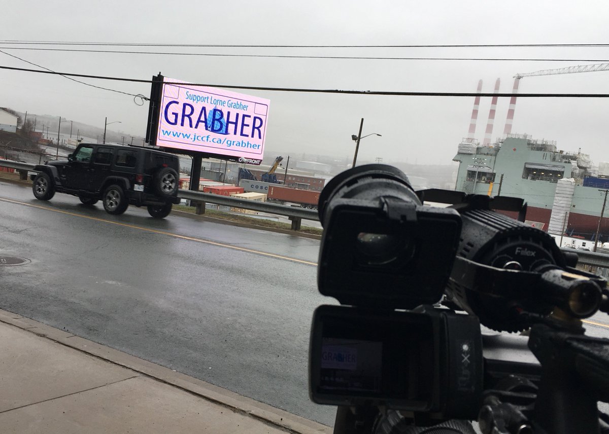 A billboard supporting Lorne Grabher's licence plate fight is seen on Barrington Street in Halifax. 