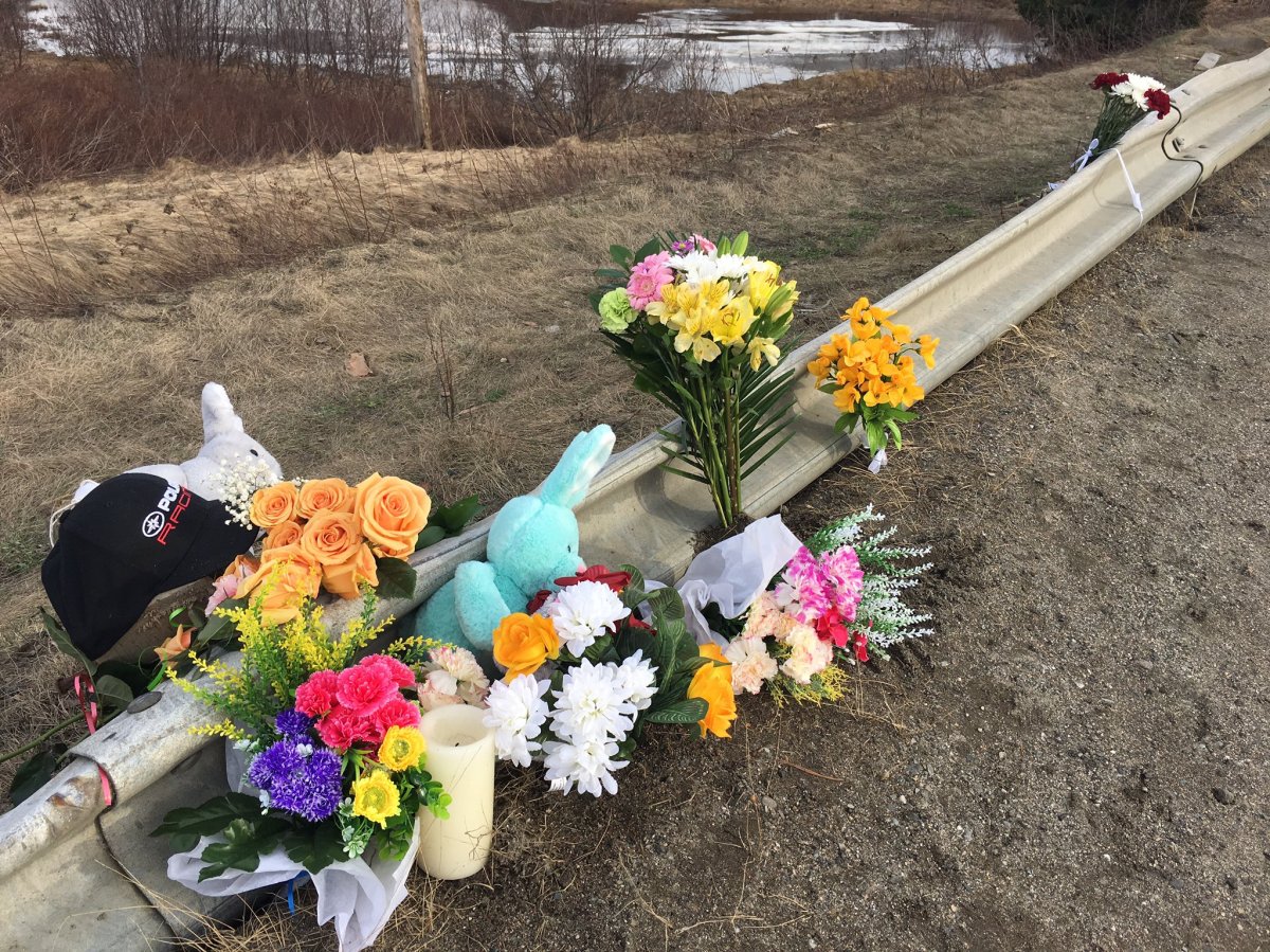 Flowers and toys mark the location of a fatal crash that claimed the lives of four teenagers near Miramichi, N.B.