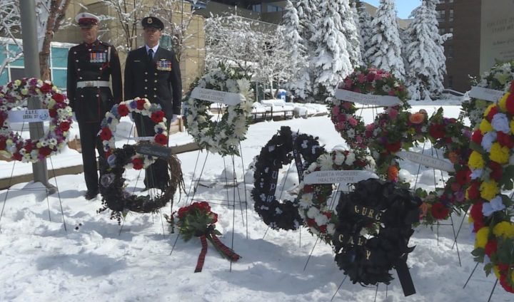 Calgarians lay wreaths at SAIT on Sunday to commemorate lives lost in the workplace.