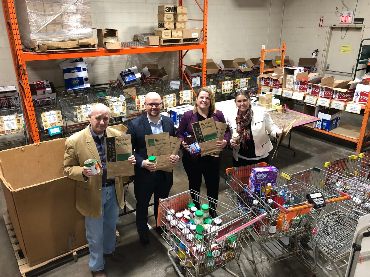 Left to right, London Food Bank co-executive director Glen Pearson, Meals on Wheels chairperson Mike Tomlinson, London Property Management Association president Lisa Smith and London Food Bank co-executive director Jane Roy.