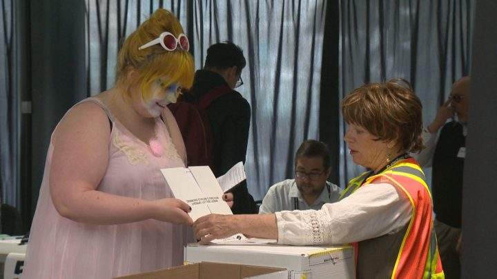 Calgary drag queens strutted to city hall to participate in advance Alberta election polls on Wednesday.