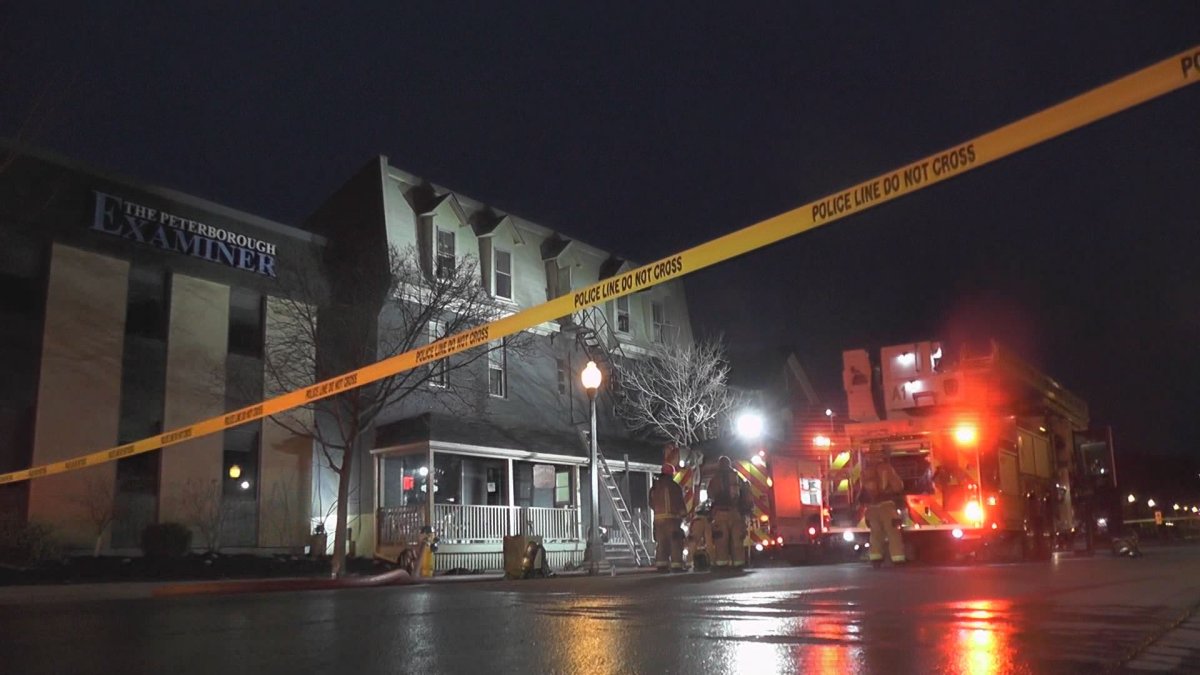 Police are investigating after money was allegedly stolen from a Peterborough building that had closed due to a fire.