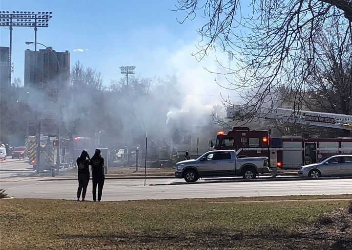 Edmonton fire crews battle a blaze in the area of 97 Avenue and Rossdale Road on April 8, 2019.