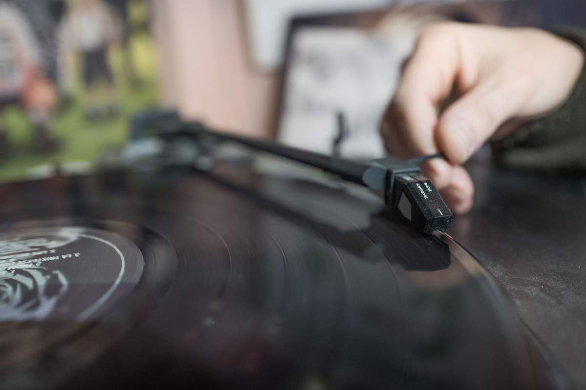 Dutch tourist Priscilla puts a record on in Vopo Records, a record shop in Berlin, Germany, April 22, 2017. Record Store Day, a celebration of vinyl records, is held every third Sunday of April.