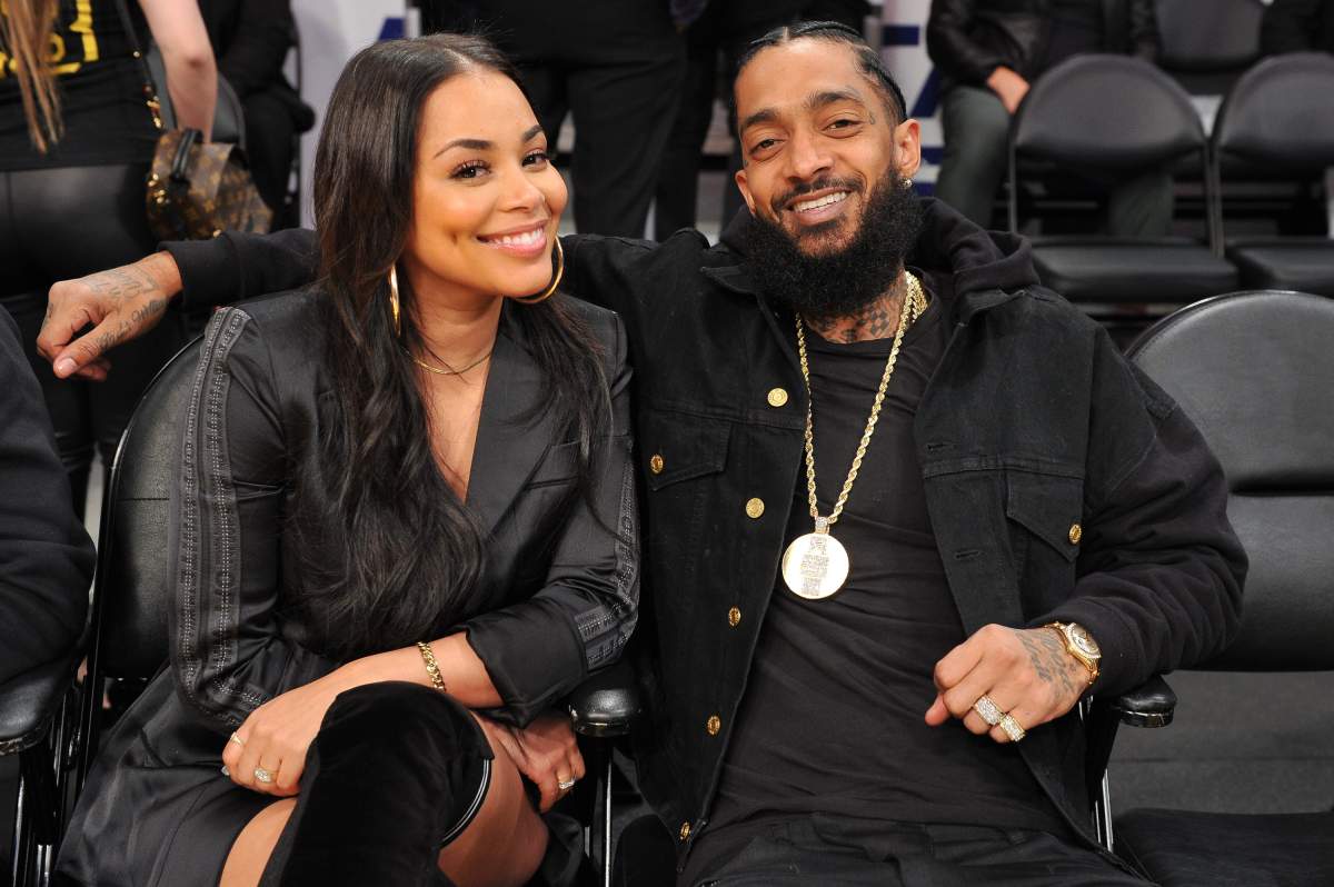 Nipsey Hussle and Lauren London attend a basketball game between the Los Angeles Lakers and the Portland Trail Blazers at Staples Center on Nov. 14, 2018, in Los Angeles, California. (Photo by Allen Berezovsky/Getty Images)