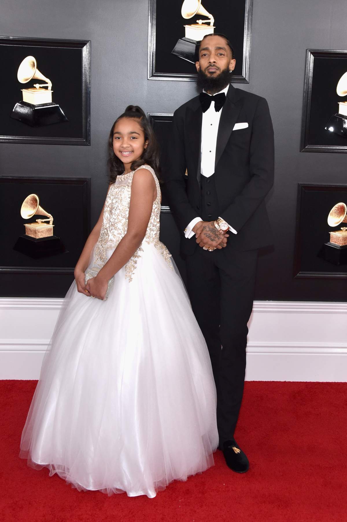 Nipsey Hussle (R) and guest attend the 61st Annual GRAMMY Awards at Staples Center on Feb. 10, 2019, in Los Angeles, California. (Photo by John Shearer/Getty Images for The Recording Academy)
