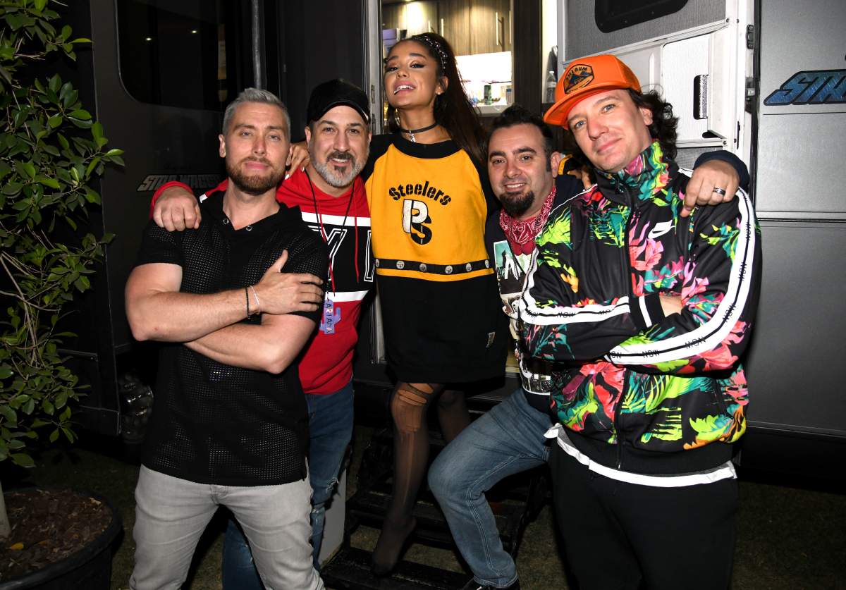Ariana Grande (C) with members of NSYNC Lance Bass, Joey Fatone, Chris Kirkpatrick and JC Chasez attend 2019 Coachella Valley Music And Arts Festival on April 14, 2019 in Indio, California. by